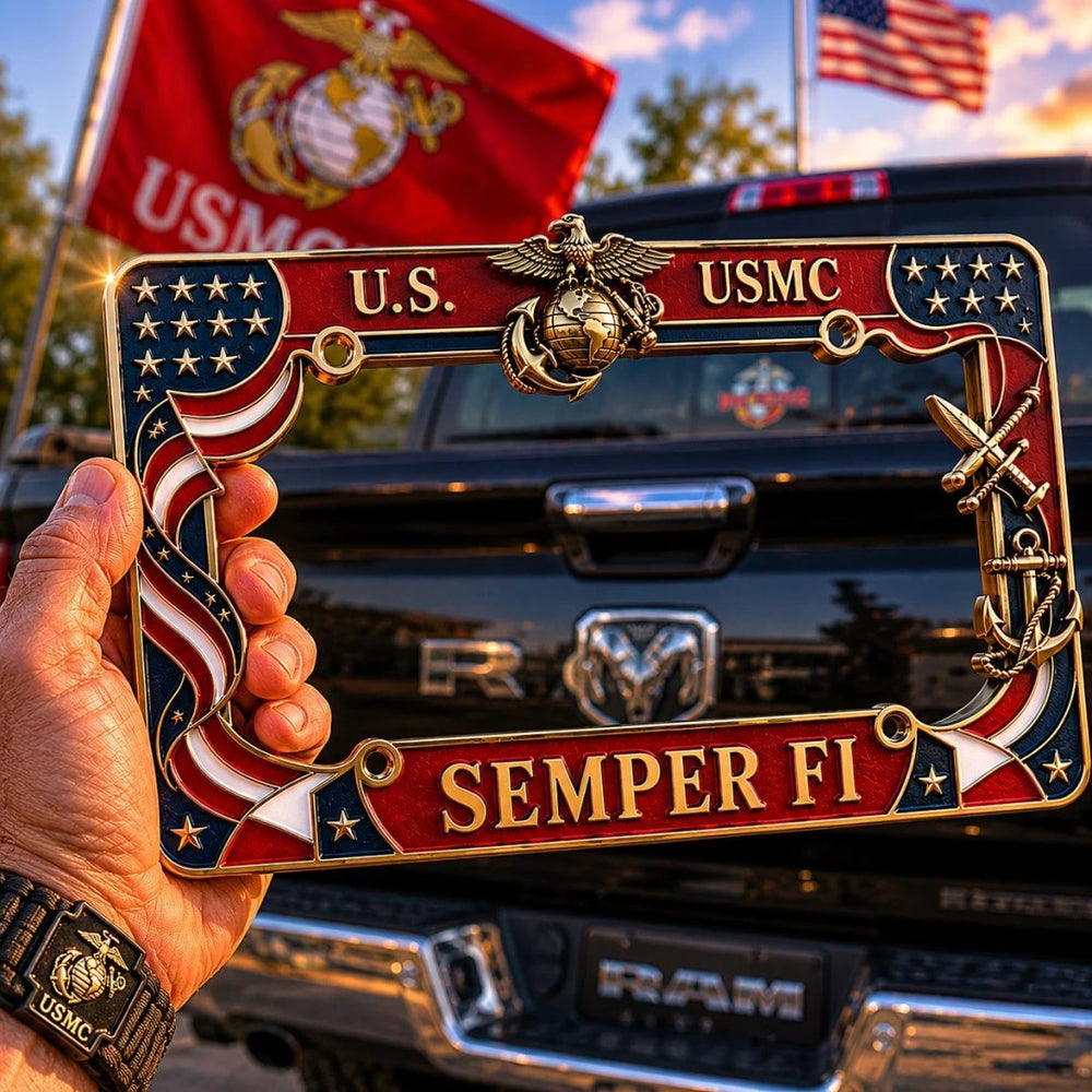 USMC military tribute license plate frame held in front of a truck