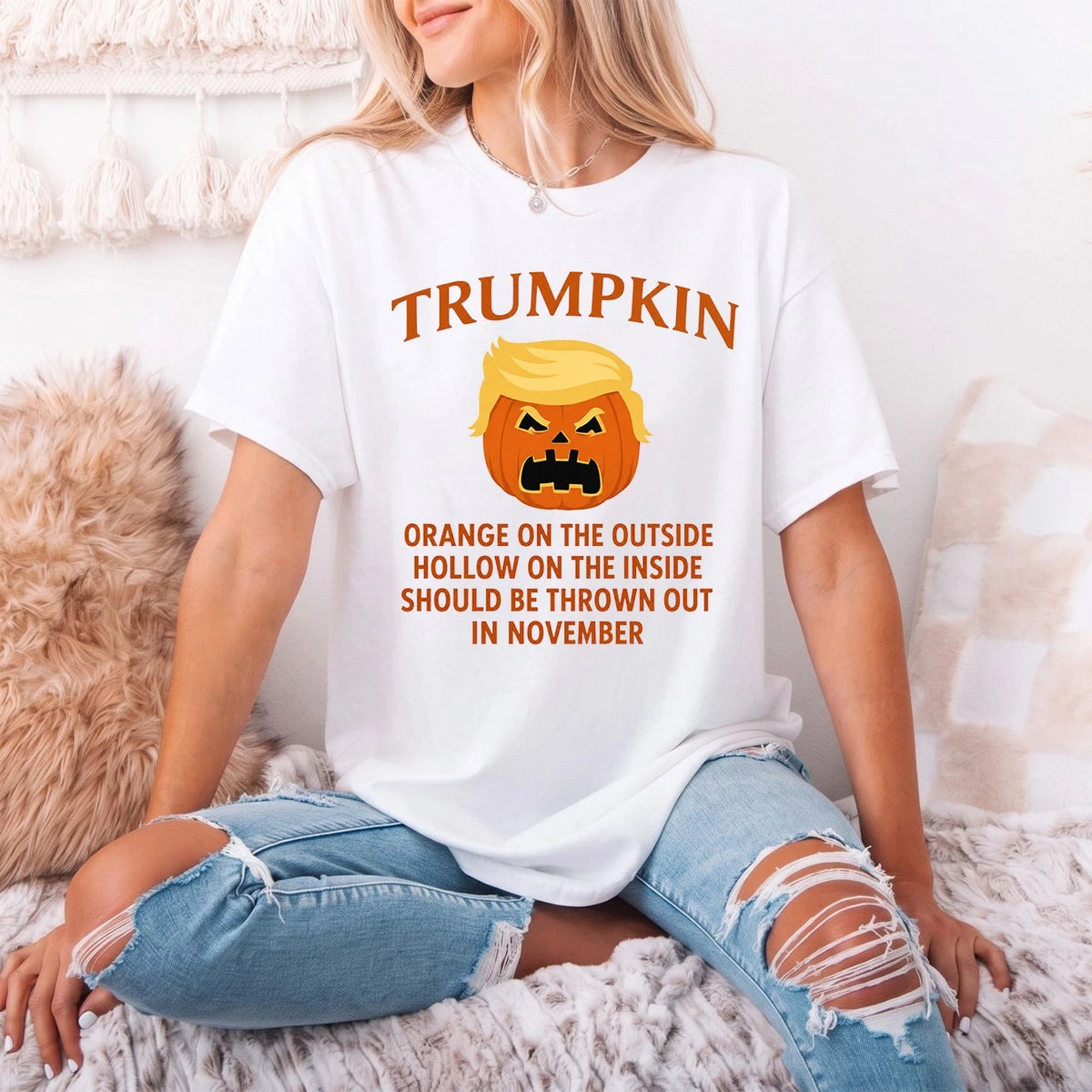 White Trumpkin graphic tee shown in a casual lifestyle setting